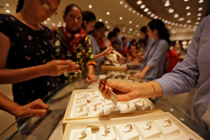 Gold prices at 15-month high on US-China trade war Gold prices at 15-month high on US-China trade war