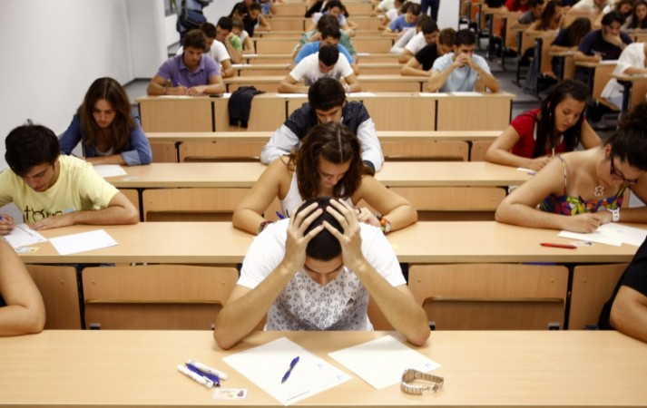 Students take a university entrance examination at a lecture hall Exams