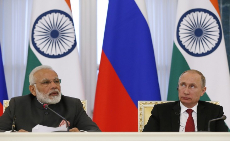 Russian President Vladimir Putin (R) and Indian Prime Minister Narendra Modi make a statement after a signing ceremony on the sidelines of the St. Petersburg International Economic Forum (SPIEF), Russia, June 1, 2017. Modi Putin