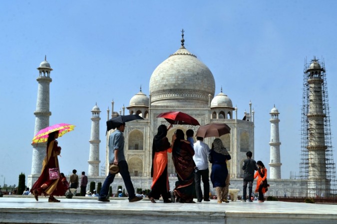 Visitors at the Taj Mahal in Agra on June 4, 2017. taj mahal, supermodels, tourism, incredible india, foreign tourists, fta, agra