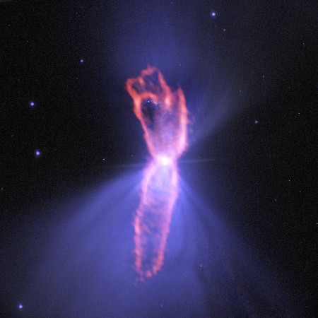 This composite image shows the Boomerang Nebula, a pre-planetary nebula produced by a dying star. Data from ALMA (orange) are shown on top of an image from NASA's Hubble Space Telescope (blue). nasa, nasa images, Boomerang Nebula, NASA's Hubble, space,