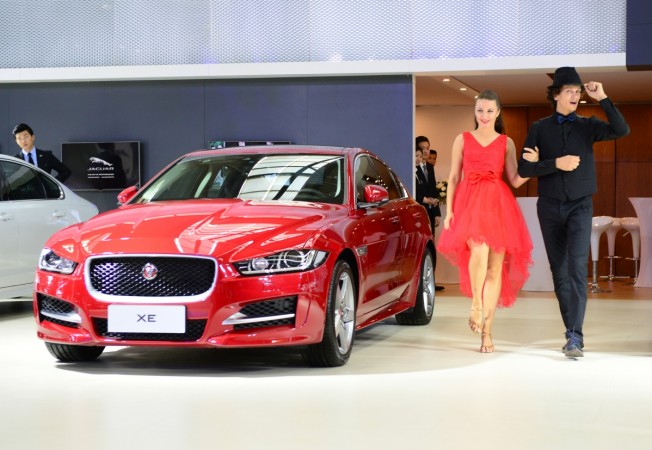 Photo taken on July 6, 2016 shows the displayed Jaguar XE car at the 7th International Auto Exhibition 2016 in Xi'an, capital of northwest China's Shaanxi Province. jlr sales may 2017, jaguar sales may 2017, land rover may 2017 sales, tata motors share price, motilal oswal on tata motors