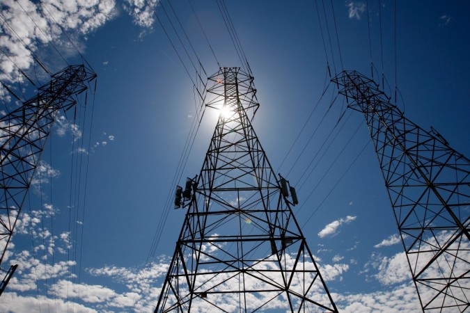 The malware has various infrastructure impacts ranging from simply turning off power distribution channels to more serious damage to equipment. In this image, the sun shines over towers carrying electrical lines in South San Francisco, California, August 30, 2007. malware targeting power grids