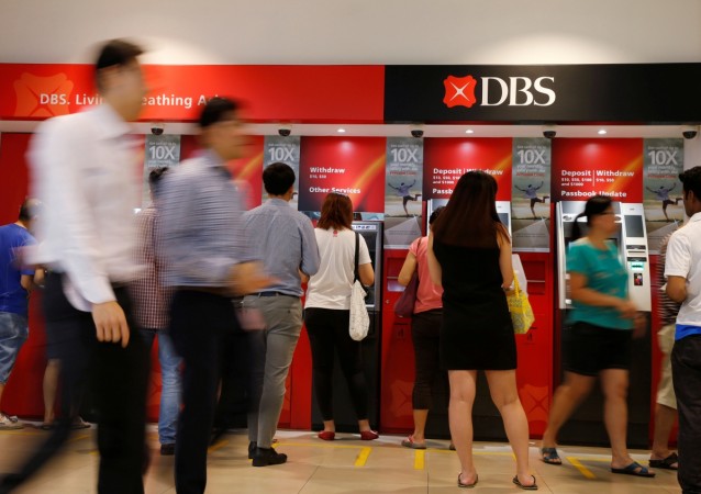 People queue up to withdraw money from DBS automated teller machines in Singapore May 3, 2016 (representational image). emkay global, dbs bank, emkay global dbs bank tie up, equity research, indian stock markets