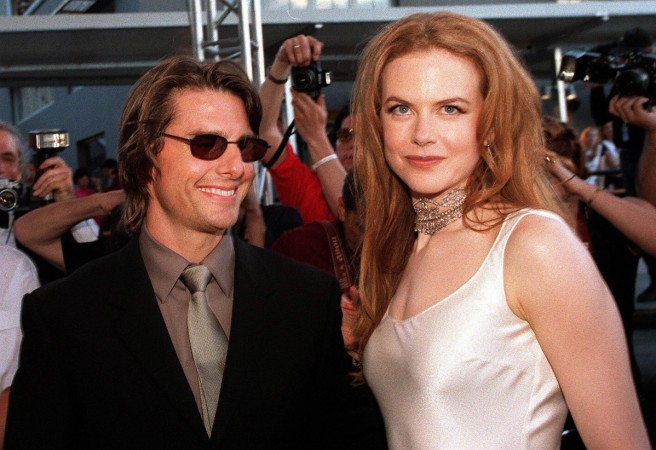 Picture taken 07 November 1999 shows actors Tom Cruise (L) and his then Australian wife, Nicole Kidman arriving at the official opening of Fox Studios Australia in Sydney. Tom Cruise and Nicole Kidman