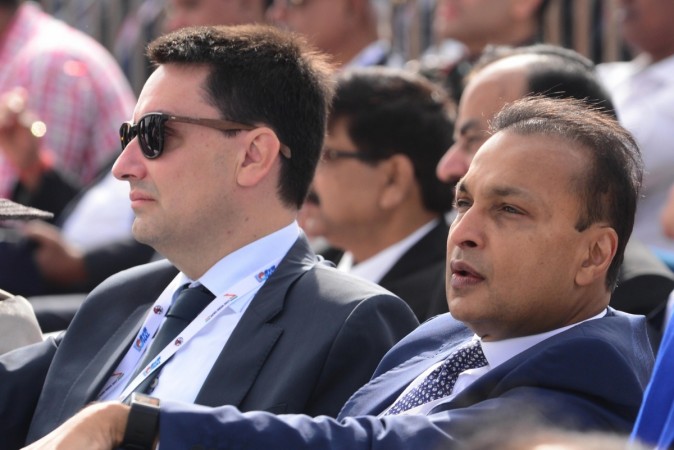 Reliance Communications chairman Anil Ambani (extreme right) at the Aero India 2017 at Yelahanka Air Force Station, Bengaluru on February 14, 2017. anil ambani, reliance communications, rcom share price, mukesh ambani brother anil, telecom war, reliance jio, bharti airtel