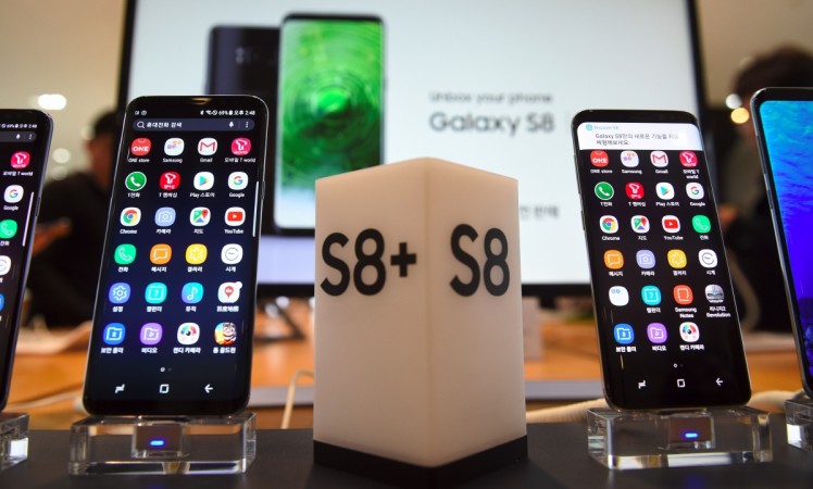 Samsung's new smartphone Galaxy S8 (R) and S8 (L) are displayed at a Samsung showroom in Seoul on April 7, 2017. Samsung Galaxy S8