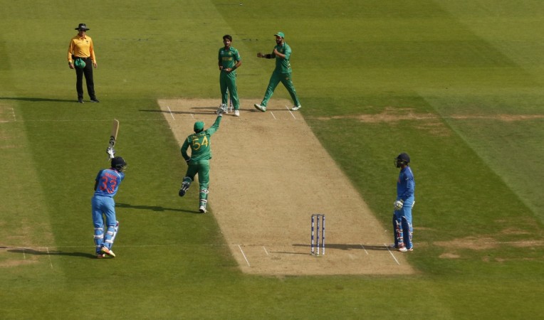 Pakistan celebrate the wicket of Hardik Pandya (left) hardik pandya, india cricket