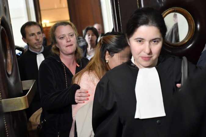 One of the victims (2ndR) arrives to attend the so-called 'Conrad princesses' trial in front of the Brussels criminal court for human trafficking, on May 11, 2017. UAE Princesses Brussels