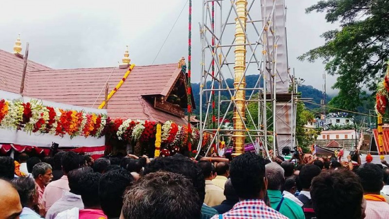 In picture: People throng the Sabarimala Ayyappa temple to witness the inauguration of the new flag mast. Sabarimala