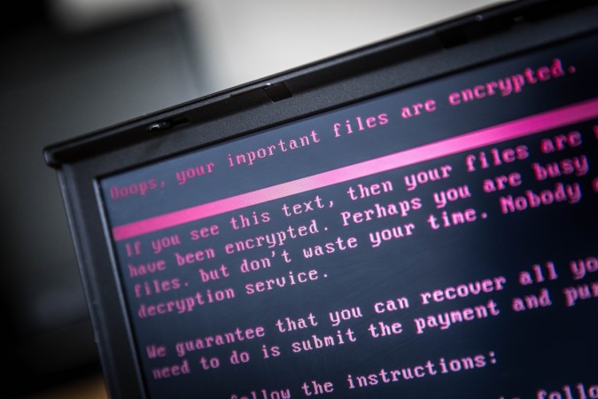 A laptop displays a message after being infected by a ransomware as part of a worldwide cyberattack on June 27, 2017 in Geldrop. Petya ransomware attack