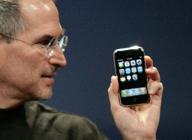 Former Apple Computer Inc. Chief Executive Officer Steve Jobs holds the new iPhone in San Francisco, California January 9, 2007. original iPhone