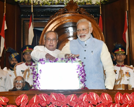 In picture: President Pranab Mukherjee and Prime Minister Narendra Modi press the buzzer to launch the Goods & Service Tax (GST) at the Central Hall of Parliament in New Delhi at midnight on June 30- July 1, 2017. President Pranab Mukherjee and Prime Minister Narendra Modi