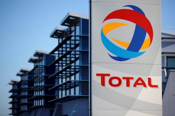 The logo of French oil giant Total is seen in front of the oil refinery of Donges, near Nantes, France Total