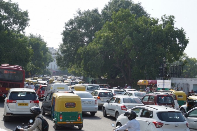 Traffic jam at Delhi's Connaught Place due to International Yoga Day preparations on June 20, 2017. traffic, car sales, vehicles, scooters, delhi, traffic jam, delhi traffic, cities, motorcycle