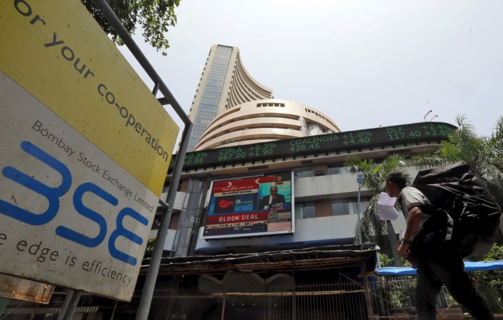 A man walks past the Bombay Stock Exchange (BSE) building in Mumbai, India, July 15, 2015. Bombay Stock Exchange (BSE)