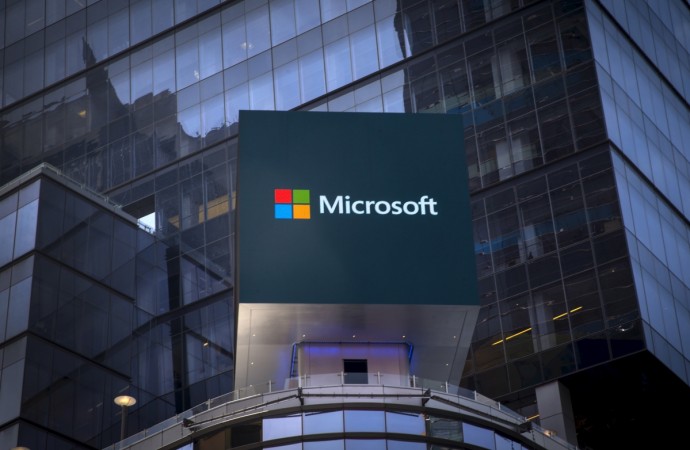 The Microsoft logo is seen on an electronic billboard on an office building in New York City, July 28, 2015. The global launch of the Microsoft Windows 10 operating system will take place on July 29. Microsoft logo