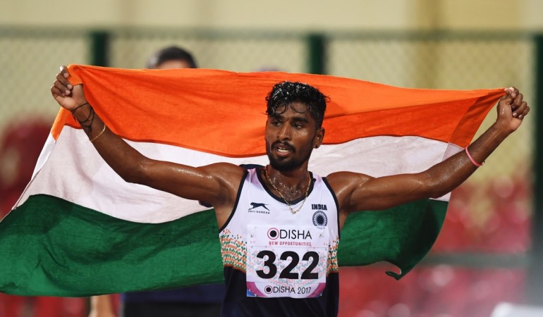 Lakshmanan celebrates his win on Thursday at the Kalinga Stadium G Lakshmanan
