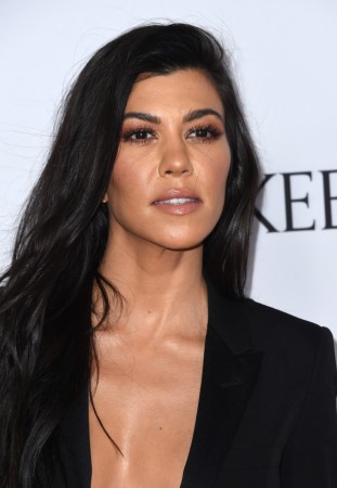 Kourtney Kardashian feels great dating a younger man. <span class= Kourtney Kardashian