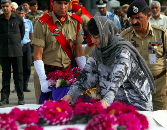 Jammu and Kashmir Chief Minister Mehbooba Mufti pays tribute to Amarnath pilgrims killed by terrorists in a militant attack in south Kashmir's Anantnag district, in Srinagar on July 11, 2017. Amarnath yatra