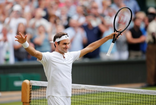 Those grass courts adore him: Roger Federer celebrates his win over Tomas Berdych, July 14, 2017 Roger Federer, Wimbledon 2017, Marin Cilic, Tomas Berdych, semifinals