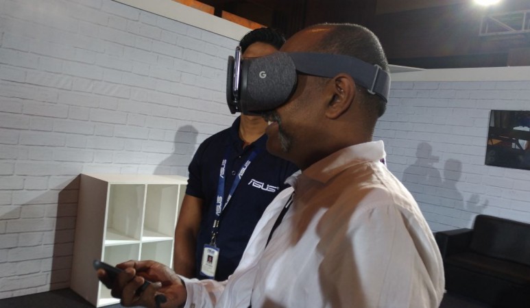 Media person trying out the Asus Zenfone AR (Google Project Tango v2.0) gaming capabilities using Google Daydream VR (Virtual Reality) head gear at the launch event in New Delhi in 13th July, 2017. Asus Zenfone AR, Zenfone AR review, Zenfone AR first impression, Google Project Tango v2.0