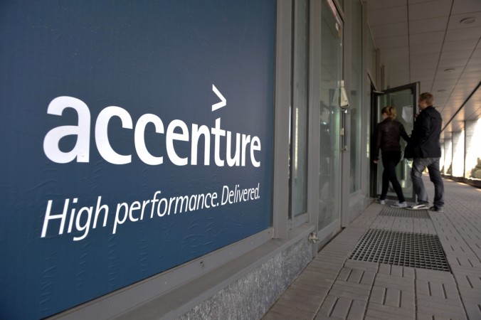 People enter an Accenture office in downtown Helsinki Accenture