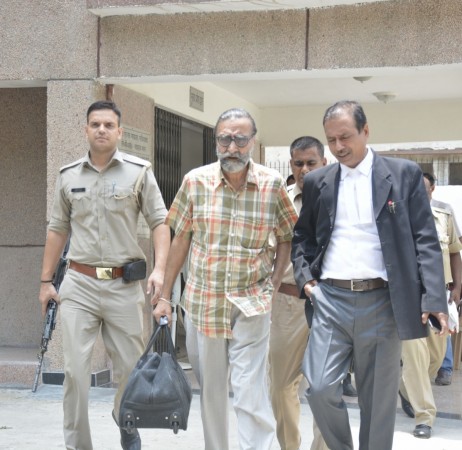 In picture: Nithari killings' convict Moninder Singh Pandher being taken away after produced before a CBI court in Ghaziabad on July 22, 2017. Moninder Singh Pandher
