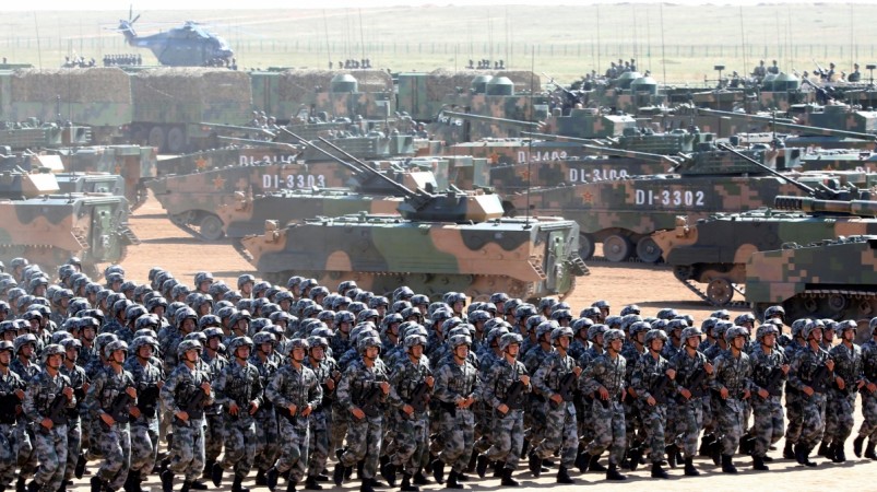 Soldiers of China's People's Liberation Army (PLA) take part in a military parade to commemorate the 90th anniversary of the foundation of the army at the Zhurihe military training base in Inner Mongolia Autonomous Region, China, July 30, 2017. Chinese Army