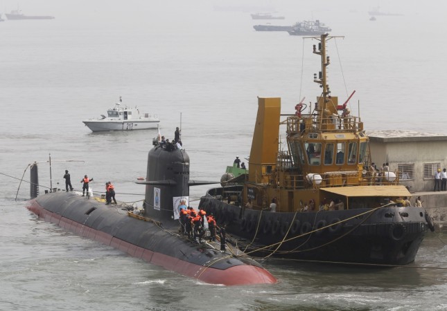 File photo of Indian Navy's Scorpene submarine INS Kalvari being escorted by tugboats as it arrives at Mazagon Docks Ltd, a naval vessel ship building yard, in Mumbai, India, October 29, 2015. REUTERS/Shailesh Andrade/Files Mazagon Docks