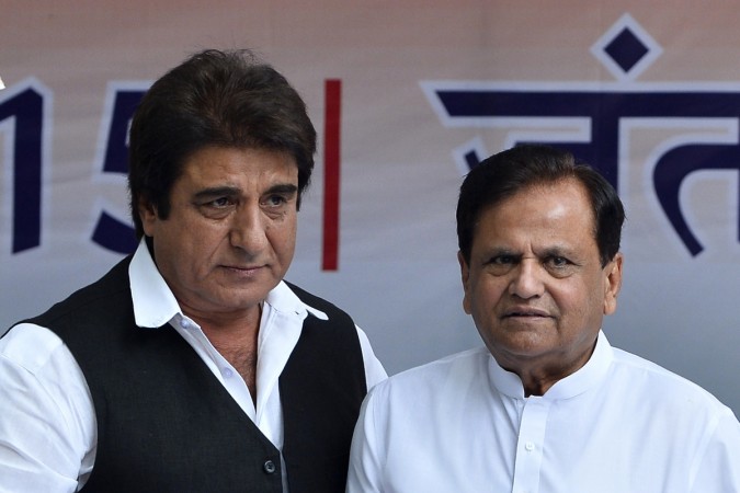 Senior Leaders of India's Congress Party, Raj Babbar (L) and Ahmed Patel (R) look on as they take part in a protest against a proposed land acquisition ordinance in New Delhi on February 25, 2015. Ahmed patel