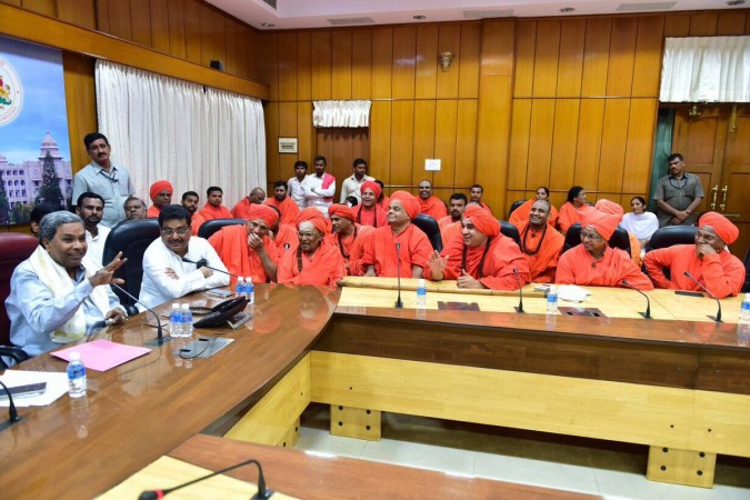 In picture: Karnataka Chief Minister Siddaramaiah gestures at a meeting with Lingayat seers from 20 mutts in Bengaluru on Friday, August 11, 2017. Lingayats