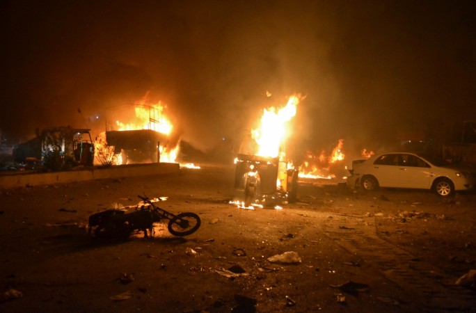 Vehicles are seen burning after a bomb blast in Quetta, Pakistan August 12, 2017. Quetta Blast