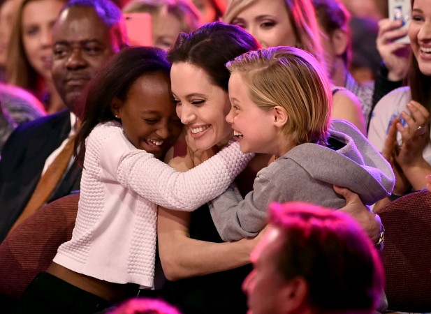 Angelina Jolie hugs Zahara Marley Jolie-Pitt (L) and Shiloh Nouvel Jolie-Pitt (R) Angelina Jolie Kids