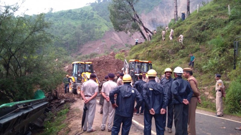 In picture: The local authorities clear roads in Mandi after a landslide killed at least 46 people in Himachal Pradesh. Mandi landslide