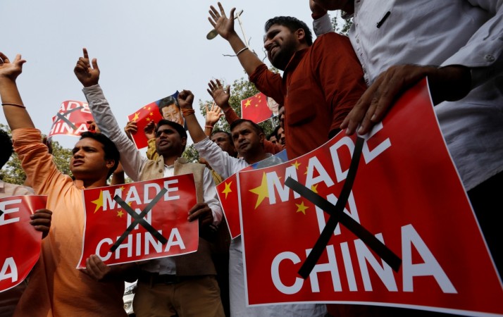 Demonstrators shout slogans during a protest organised by the activists of Swadeshi Jagran Manch, a wing of the Hindu nationalist organisation Rashtriya Swayamsevak Sangh (RSS), as they demand the boycott of Chinese products, in New Delhi, India, October 26, 2016. made in China India