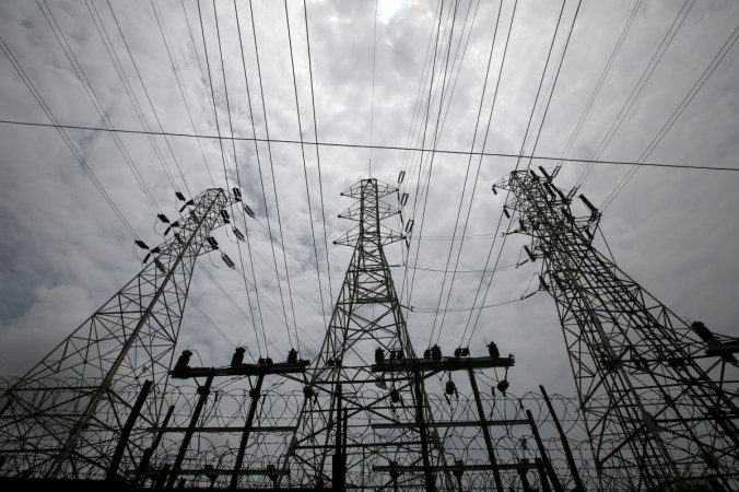 High-tension power lines are pictured outside a Tata Power sub-station in the suburbs of Mumbai in this file photo. REUTERS/Shailesh Andrade Tata Power