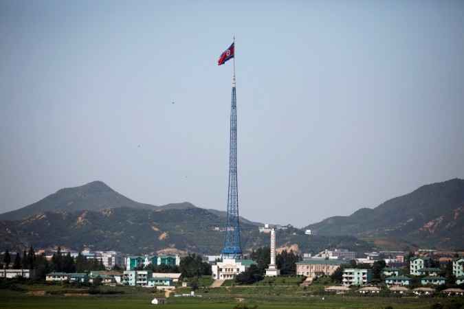 A North Korean flag flutters on top of a tower at the propaganda village of Gijungdong in North Korea, in this picture taken near the truce village of Panmunjom, South Korea, August 26, 2017. North Korean flag
