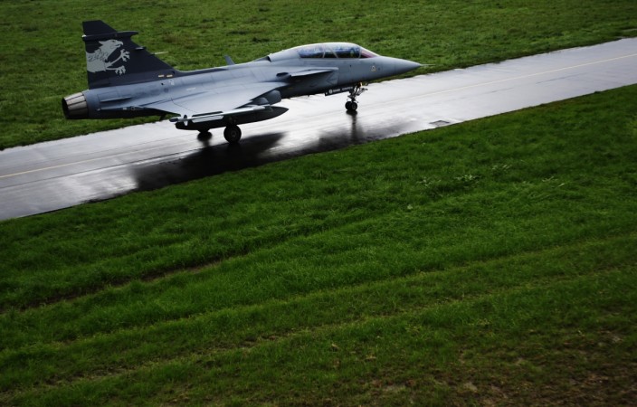 A Swedish Saab Gripen F fighter jet taxis during a media presentation at the Swiss Army Airbase in Emmen, central Switzerland Fighter jet