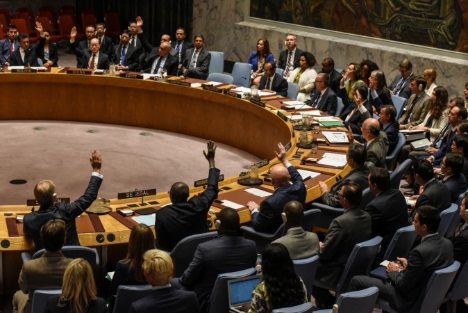Ambassadors to the UN vote during a United Nations Security Council meeting on North Korea in New York City UNSC