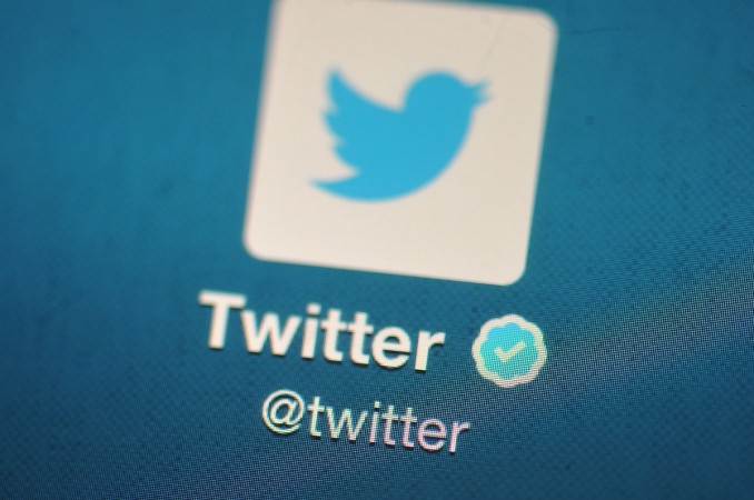 In this photo illustration, The Twitter logo is displayed on a mobile device as the company announced it's initial public offering and debut on the New York Stock Exchange on November 7, 2013 in London, England. Twitter