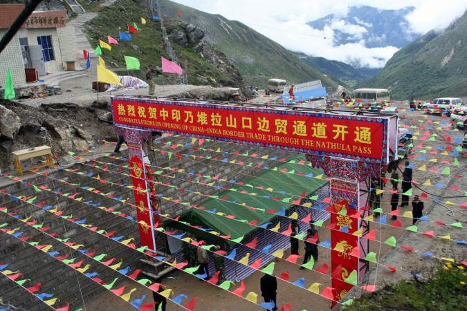 Chinese workers decorate the Chinese side of the border of Nathu La, some 52 kilometres (33 miles) east of Gangtok Nathu La
