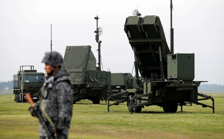 A Japan Self-Defense Forces (JSDF) soldier takes part in a drill to mobilise their Patriot Advanced Capability-3 (PAC-3) missile unit in response to a recent missile launch by North Korea, at U.S. Air Force Yokota Air Base in Fussa on the outskirts of Tokyo, Japan August 29, 2017. Japan Self-Defense Forces