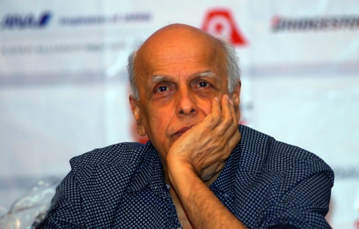 Indian Bollywood film director Mahesh Bhatt looks on during an event to announce the first 'Japan Film Festival Indian (JFFI) 2014' in Mumbai on December 2, 2014. Mahesh Bhatt
