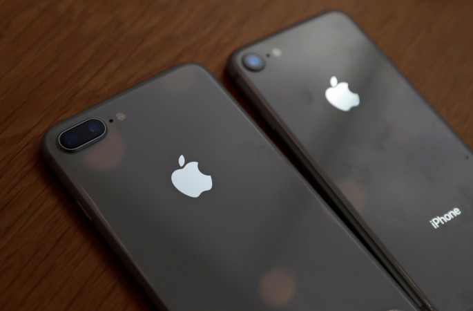 Apple's new iPhone 8 (R) and 8 Plus are seen after they go on sale at the Apple Store in Tokyo's Omotesando shopping district, Japan, September 22, 2017. Apple iPhone 8