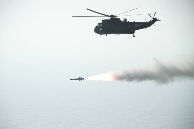 In picture: A Sea King helicopter of Pakistan fires an anti-ship missile in the northern Arabian Sea on Saturday, September 23, 2017. Pakistan Sea King helicopter in the northern Arabian Sea