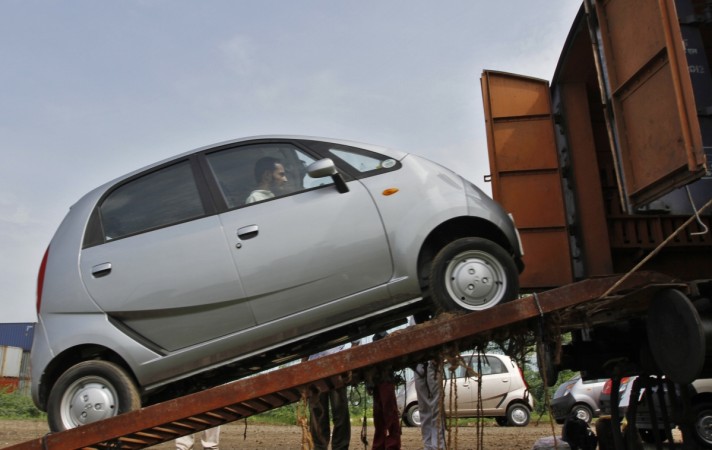 A Tata Motors Nano car is loaded onto a goods train for shipment at Sanand railway station in Gujarat in this September 1, 2011, file photo. Tata Motors has hinted at phasing out the Nano but may not do so immediately. REUTERS/Amit Dave Tata Nano