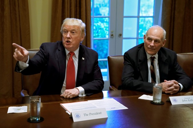 U.S. President Donald Trump gestures next to White House Chief of Staff John Kelly during a briefing with senior military leaders at the White House in Washington, U.S., October 5, 2017. United States President, Donald John Trump and White House Chief of Staff John Francis Kelly