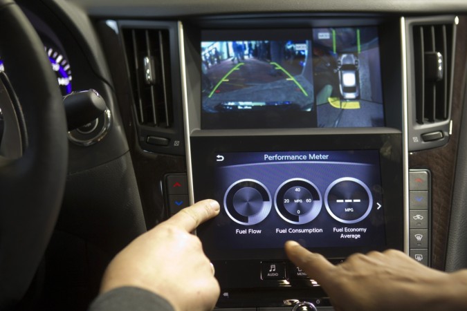 An Infiniti InTouch infotainment system is demonstrated inside an Infinity Q50S car infotainment, car infotainment tech