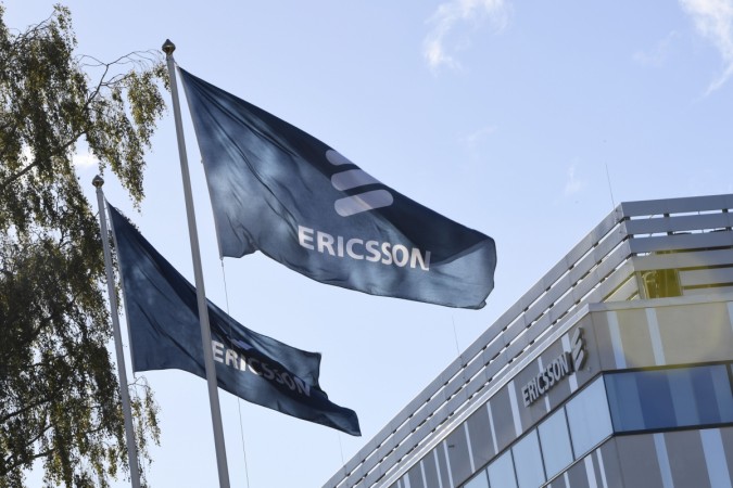 Flags with the logo of telecoms equipment maker Ericsson flutter outside the company's headquarters in Stockholm Ericsson